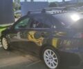 Чорний Міцубісі Lancer, об'ємом двигуна 2 л та пробігом 134 тис. км за 29034 $, фото 9 на Automoto.ua