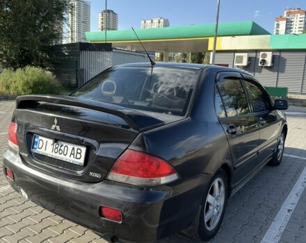 Чорний Міцубісі Lancer, об'ємом двигуна 1.6 л та пробігом 364 тис. км за 3000 $, фото 2 на Automoto.ua