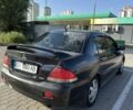 Чорний Міцубісі Lancer, об'ємом двигуна 1.6 л та пробігом 364 тис. км за 3000 $, фото 2 на Automoto.ua