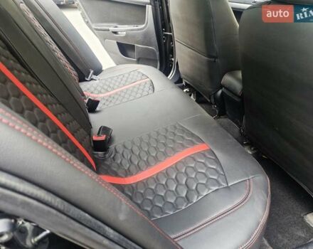 Чорний Міцубісі Lancer, об'ємом двигуна 2 л та пробігом 240 тис. км за 7850 $, фото 31 на Automoto.ua