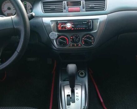 Чорний Міцубісі Lancer, об'ємом двигуна 1.58 л та пробігом 286 тис. км за 4950 $, фото 1 на Automoto.ua