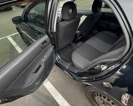 Чорний Міцубісі Lancer, об'ємом двигуна 1.6 л та пробігом 245 тис. км за 4500 $, фото 18 на Automoto.ua