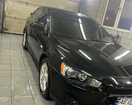 Черный Мицубиси Лансер, объемом двигателя 2 л и пробегом 200 тыс. км за 8000 $, фото 3 на Automoto.ua