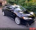 Чорний Міцубісі Lancer, об'ємом двигуна 2 л та пробігом 165 тис. км за 7500 $, фото 1 на Automoto.ua