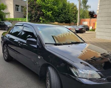 Чорний Міцубісі Lancer, об'ємом двигуна 1.58 л та пробігом 334 тис. км за 4750 $, фото 7 на Automoto.ua