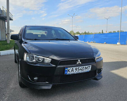 Чорний Міцубісі Lancer, об'ємом двигуна 2 л та пробігом 249 тис. км за 6500 $, фото 4 на Automoto.ua