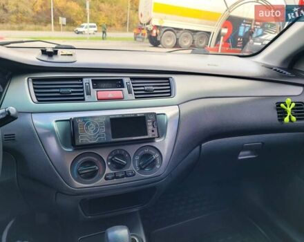 Міцубісі Lancer 2008 у Тернополі на Automoto.ua Чорний Міцубісі Lancer, об'ємом двигуна 1.58 л та пробігом 182 тис. км за 5600 $, фото 15 на Automoto.ua