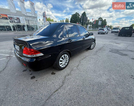 Чорний Міцубісі Lancer, об'ємом двигуна 1.6 л та пробігом 292 тис. км за 3600 $, фото 8 на Automoto.ua
