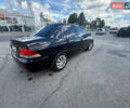 Чорний Міцубісі Lancer, об'ємом двигуна 1.6 л та пробігом 292 тис. км за 3600 $, фото 8 на Automoto.ua
