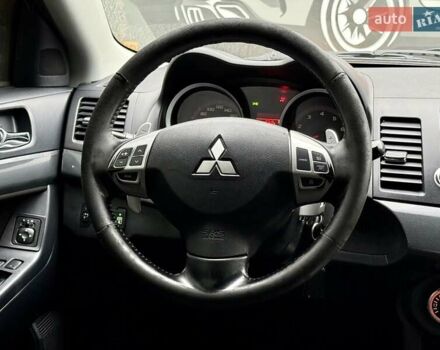 Чорний Міцубісі Lancer, об'ємом двигуна 2 л та пробігом 118 тис. км за 6200 $, фото 13 на Automoto.ua