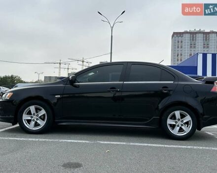 Чорний Міцубісі Lancer, об'ємом двигуна 2 л та пробігом 199 тис. км за 7900 $, фото 4 на Automoto.ua