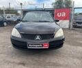 Мицубиси Лансер 2008 в Запорожье на Automoto.ua Черный Мицубиси Лансер, объемом двигателя 1.6 л и пробегом 316 тыс. км за 4290 $, фото 1 на Automoto.ua