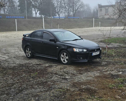 Чорний Міцубісі Lancer, об'ємом двигуна 2 л та пробігом 249 тис. км за 6500 $, фото 12 на Automoto.ua