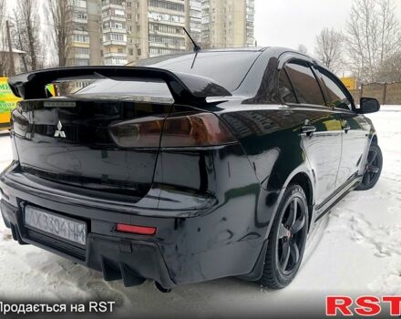 Чорний Міцубісі Lancer, об'ємом двигуна 2 л та пробігом 170 тис. км за 7800 $, фото 7 на Automoto.ua