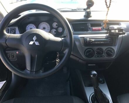 Черный Мицубиси Лансер, объемом двигателя 1.6 л и пробегом 356 тыс. км за 4590 $, фото 4 на Automoto.ua