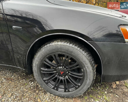 Черный Мицубиси Лансер, объемом двигателя 1.5 л и пробегом 278 тыс. км за 4200 $, фото 6 на Automoto.ua