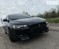 Чорний Міцубісі Lancer, об'ємом двигуна 2 л та пробігом 200 тис. км за 7600 $, фото 6 на Automoto.ua