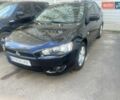 Черный Мицубиси Лансер, объемом двигателя 2 л и пробегом 180 тыс. км за 7800 $, фото 1 на Automoto.ua