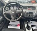 Мицубиси Лансер 2008 в Запорожье на Automoto.ua Черный Мицубиси Лансер, объемом двигателя 1.6 л и пробегом 316 тыс. км за 4290 $, фото 9 на Automoto.ua