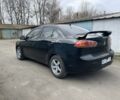 Черный Мицубиси Лансер, объемом двигателя 1.5 л и пробегом 279 тыс. км за 5699 $, фото 6 на Automoto.ua