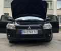 Чорний Міцубісі Lancer, об'ємом двигуна 2 л та пробігом 206 тис. км за 5600 $, фото 54 на Automoto.ua