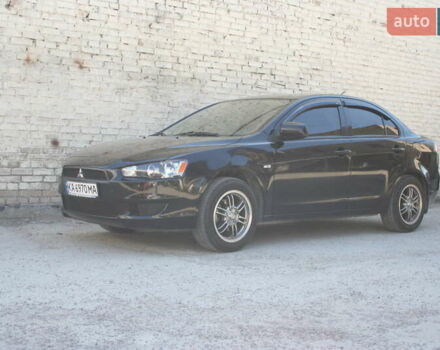 Черный Мицубиси Лансер, объемом двигателя 1.5 л и пробегом 110 тыс. км за 6950 $, фото 7 на Automoto.ua