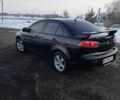 Черный Мицубиси Лансер, объемом двигателя 1.5 л и пробегом 260 тыс. км за 5900 $, фото 1 на Automoto.ua