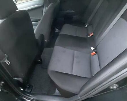 Черный Мицубиси Лансер, объемом двигателя 2 л и пробегом 63 тыс. км за 8000 $, фото 6 на Automoto.ua