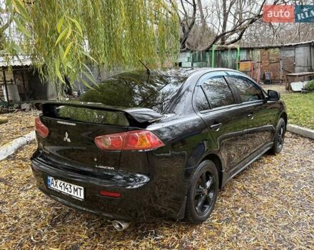 Черный Мицубиси Лансер, объемом двигателя 2 л и пробегом 260 тыс. км за 6100 $, фото 5 на Automoto.ua