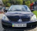 Міцубісі Lancer 2008 у Тернополі на Automoto.ua Чорний Міцубісі Lancer, об'ємом двигуна 1.58 л та пробігом 182 тис. км за 5600 $, фото 6 на Automoto.ua