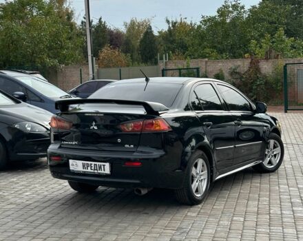 Чорний Міцубісі Lancer, об'ємом двигуна 2 л та пробігом 239 тис. км за 6900 $, фото 2 на Automoto.ua