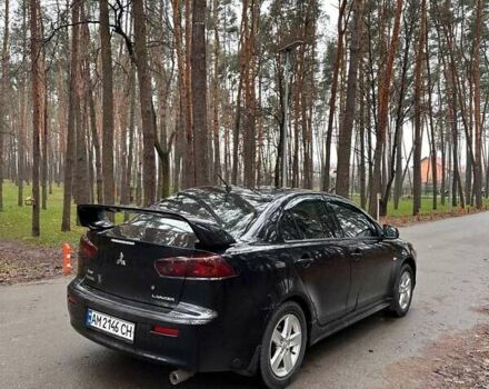 Чорний Міцубісі Lancer, об'ємом двигуна 2 л та пробігом 263 тис. км за 5750 $, фото 3 на Automoto.ua