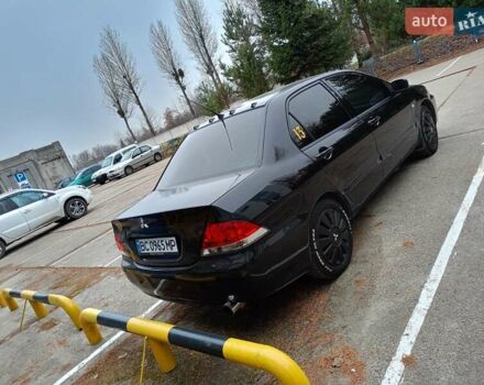 Мицубиси Лансер 2008 в Львове на Automoto.ua Черный Мицубиси Лансер, объемом двигателя 1.58 л и пробегом 200 тыс. км за 5200 $, фото 56 на Automoto.ua