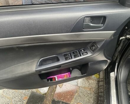 Черный Мицубиси Лансер, объемом двигателя 2 л и пробегом 190 тыс. км за 3100 $, фото 8 на Automoto.ua