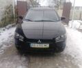 Чорний Міцубісі Lancer, об'ємом двигуна 2 л та пробігом 200 тис. км за 5400 $, фото 1 на Automoto.ua