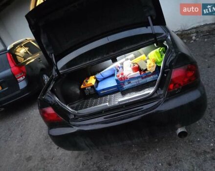 Мицубиси Лансер 2008 в Львове на Automoto.ua Черный Мицубиси Лансер, объемом двигателя 1.58 л и пробегом 200 тыс. км за 5200 $, фото 35 на Automoto.ua