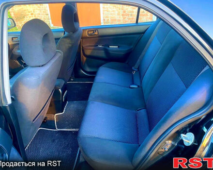 Чорний Міцубісі Lancer, об'ємом двигуна 1.6 л та пробігом 219 тис. км за 4800 $, фото 5 на Automoto.ua