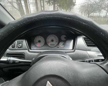 Черный Мицубиси Лансер, объемом двигателя 1.58 л и пробегом 214 тыс. км за 4400 $, фото 23 на Automoto.ua