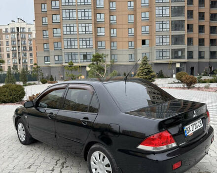 Черный Мицубиси Лансер, объемом двигателя 1.6 л и пробегом 240 тыс. км за 5200 $, фото 6 на Automoto.ua