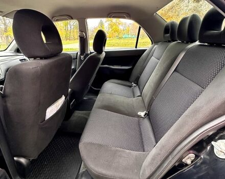 Черный Мицубиси Лансер, объемом двигателя 1.6 л и пробегом 185 тыс. км за 5500 $, фото 6 на Automoto.ua