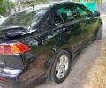 Чорний Міцубісі Lancer, об'ємом двигуна 1.5 л та пробігом 168 тис. км за 5900 $, фото 1 на Automoto.ua