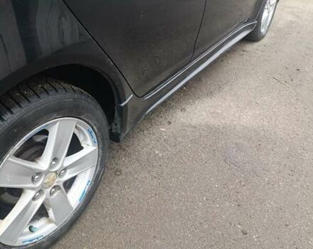 Черный Мицубиси Лансер, объемом двигателя 2 л и пробегом 192 тыс. км за 6350 $, фото 6 на Automoto.ua