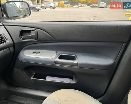 Чорний Міцубісі Lancer, об'ємом двигуна 1.58 л та пробігом 192 тис. км за 4500 $, фото 14 на Automoto.ua