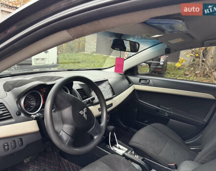 Черный Мицубиси Лансер, объемом двигателя 1.5 л и пробегом 278 тыс. км за 4200 $, фото 11 на Automoto.ua