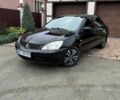 Чорний Міцубісі Lancer, об'ємом двигуна 1.6 л та пробігом 220 тис. км за 3600 $, фото 1 на Automoto.ua