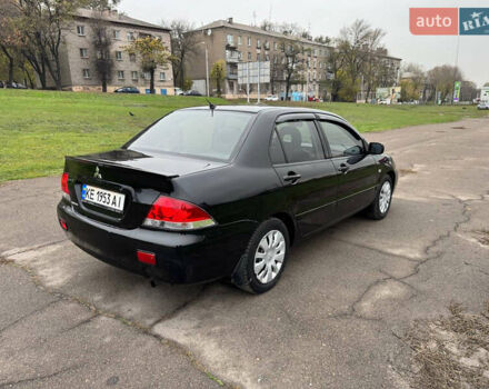 Чорний Міцубісі Lancer, об'ємом двигуна 1.6 л та пробігом 200 тис. км за 4500 $, фото 8 на Automoto.ua