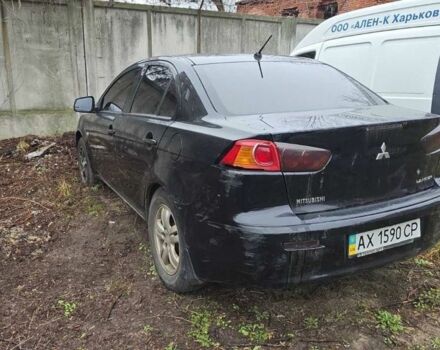 Черный Мицубиси Лансер, объемом двигателя 1.5 л и пробегом 300 тыс. км за 2500 $, фото 6 на Automoto.ua