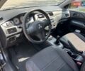Чорний Міцубісі Lancer, об'ємом двигуна 1.6 л та пробігом 296 тис. км за 4200 $, фото 33 на Automoto.ua
