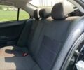 Чорний Міцубісі Lancer, об'ємом двигуна 2 л та пробігом 205 тис. км за 6800 $, фото 4 на Automoto.ua