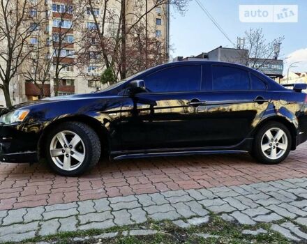 Чорний Міцубісі Lancer, об'ємом двигуна 2 л та пробігом 182 тис. км за 7650 $, фото 11 на Automoto.ua